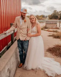 A man and woman posing for a picture.